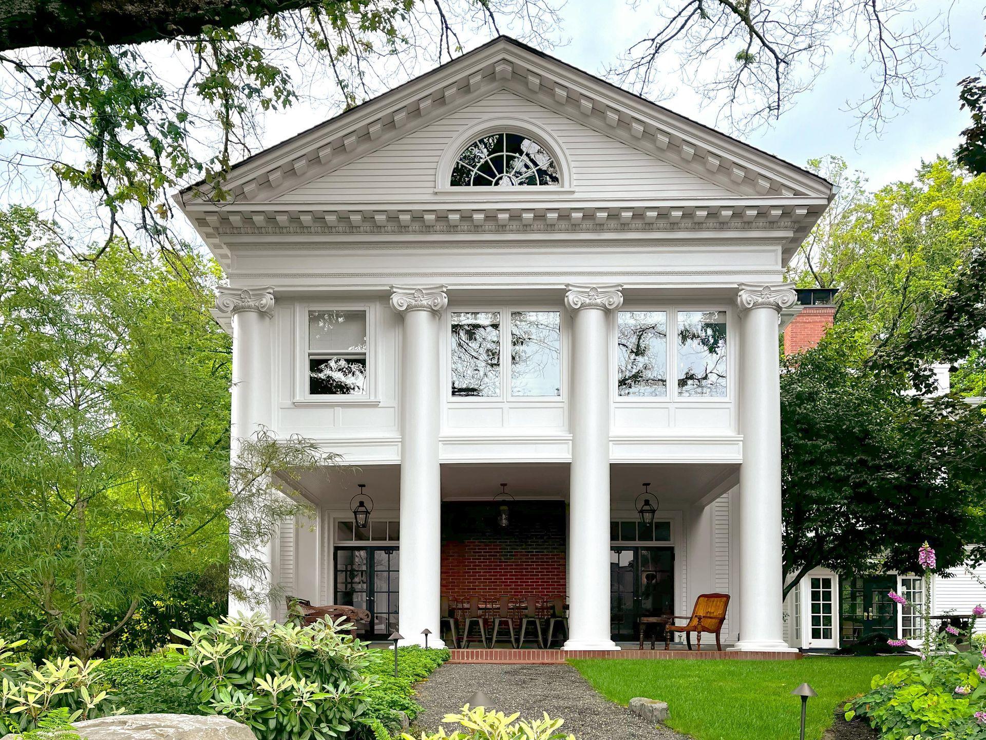 Sleeping porch from exterior in 1913 colonial revival.