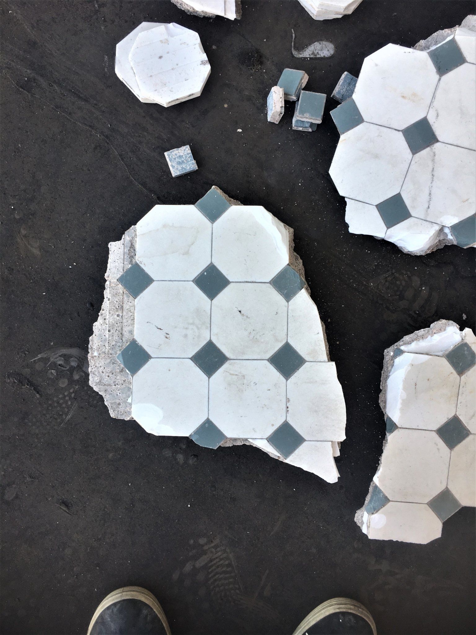 The floor tile was on a 6” bed of masonry and the tiles measure ¼” – 1/2 “thick!