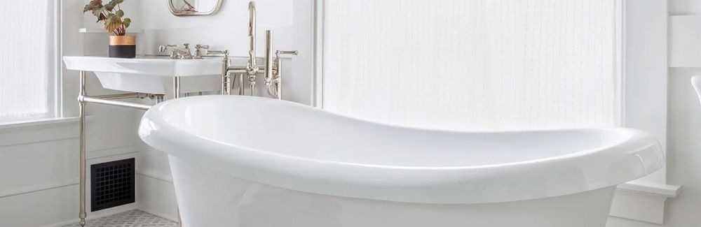 Modern acrylic tub in remodeled bathroom