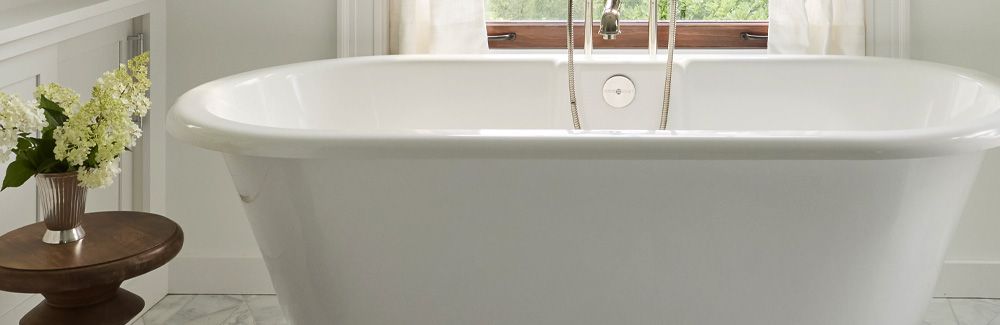 Enameled cast-iron tub in remodeled bathroom.