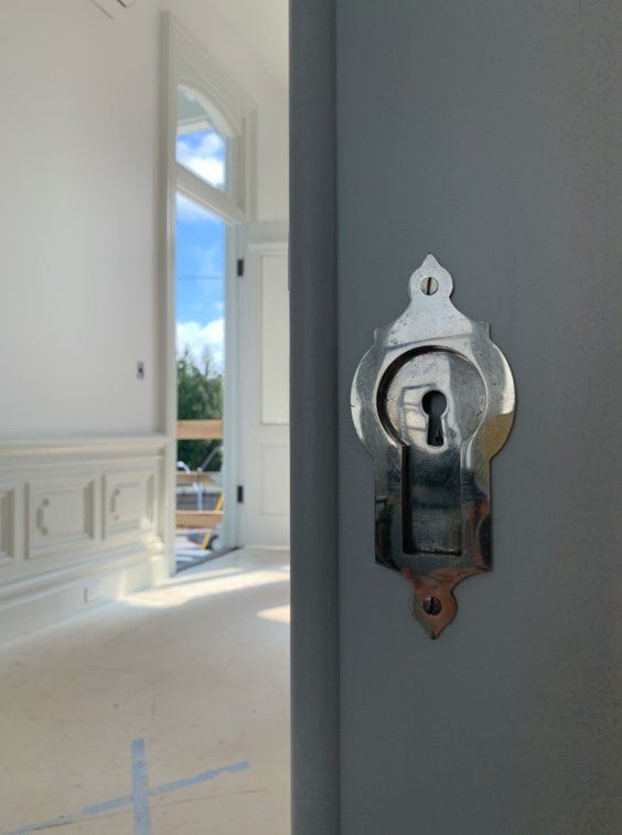 A door with a keyhole in the middle of it