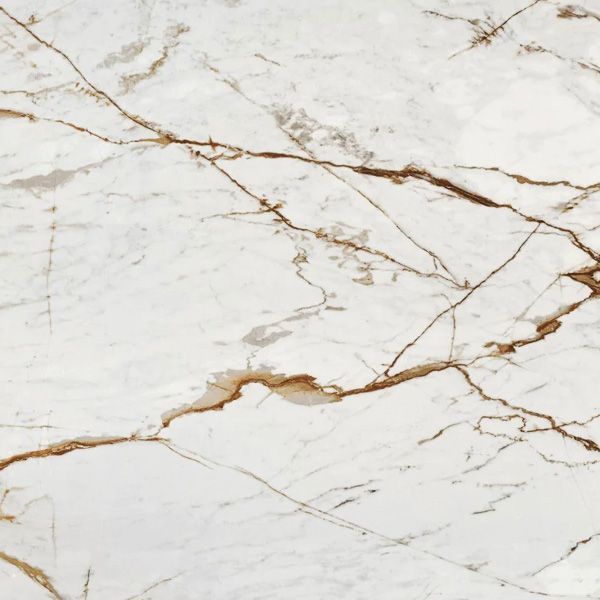 White marble countertop with grey veining.