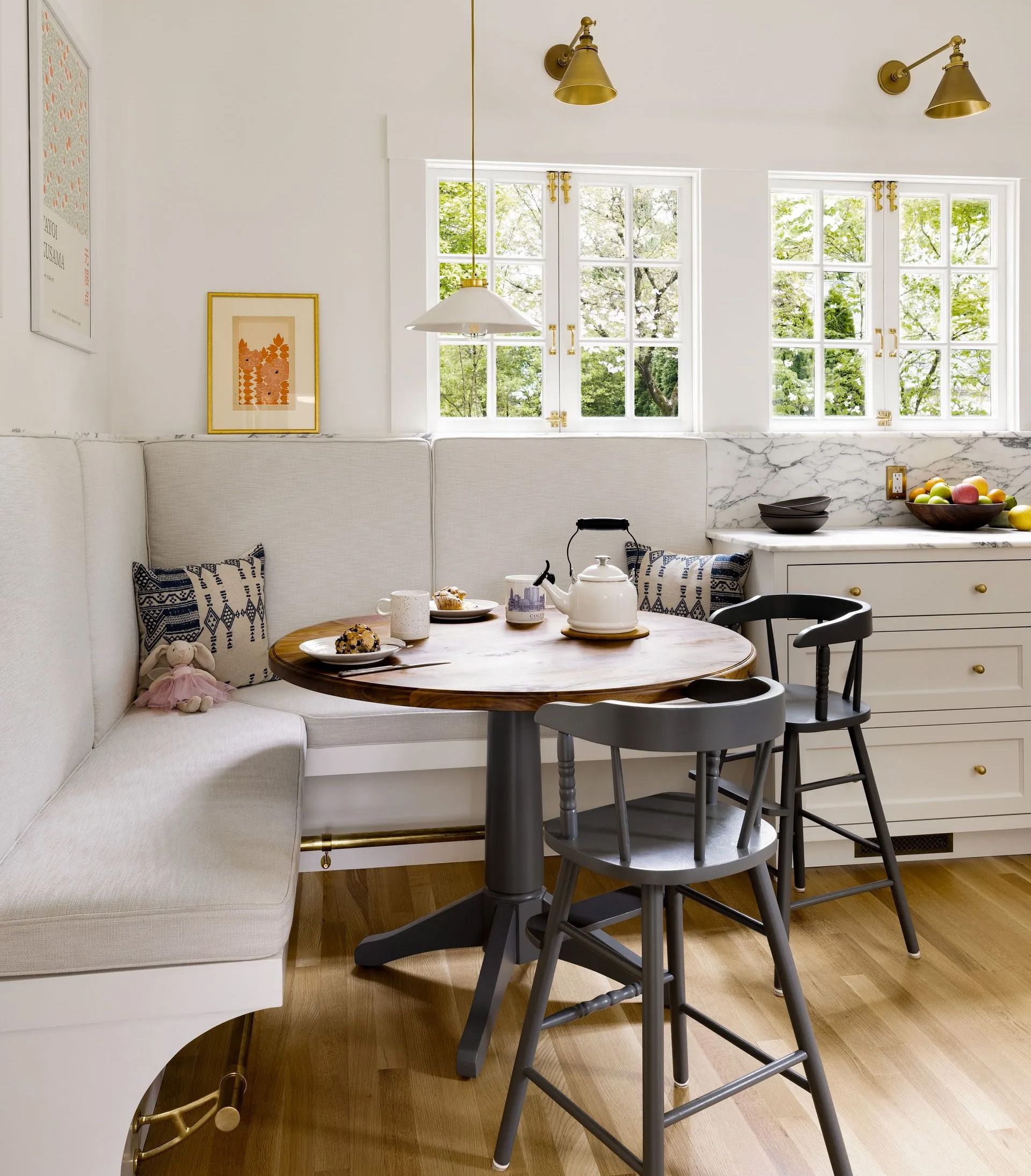 In one corner of the Laurelhurst kitchen show in the photo above, Arciform created a cozy family dining area and built two new windows to match the existing outswing casements.