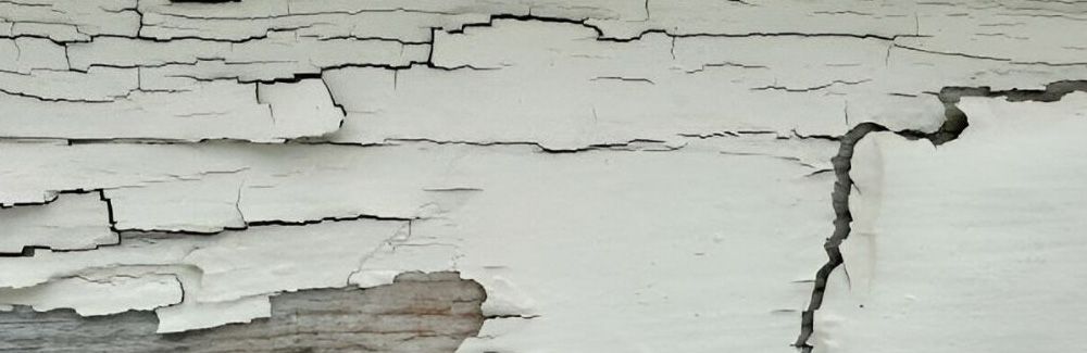 Flaking lead paint on exterior siding.