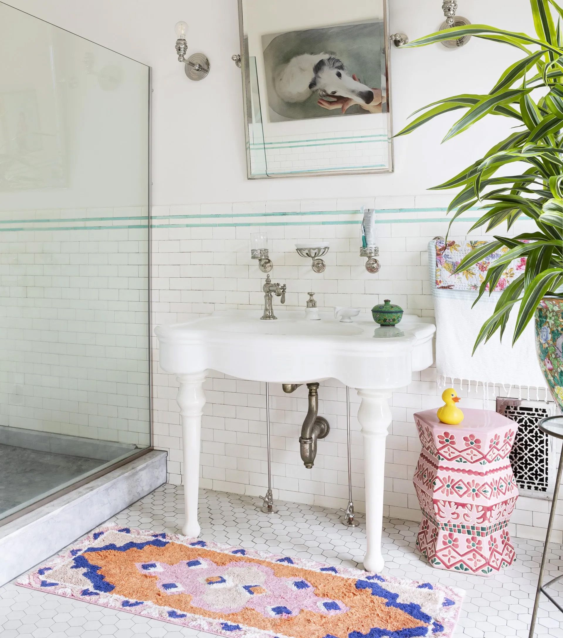 Preserving original tile , fixtures, and hardware while updating systems, is one approach Arciform often employs when renovating bathrooms in period homes. 