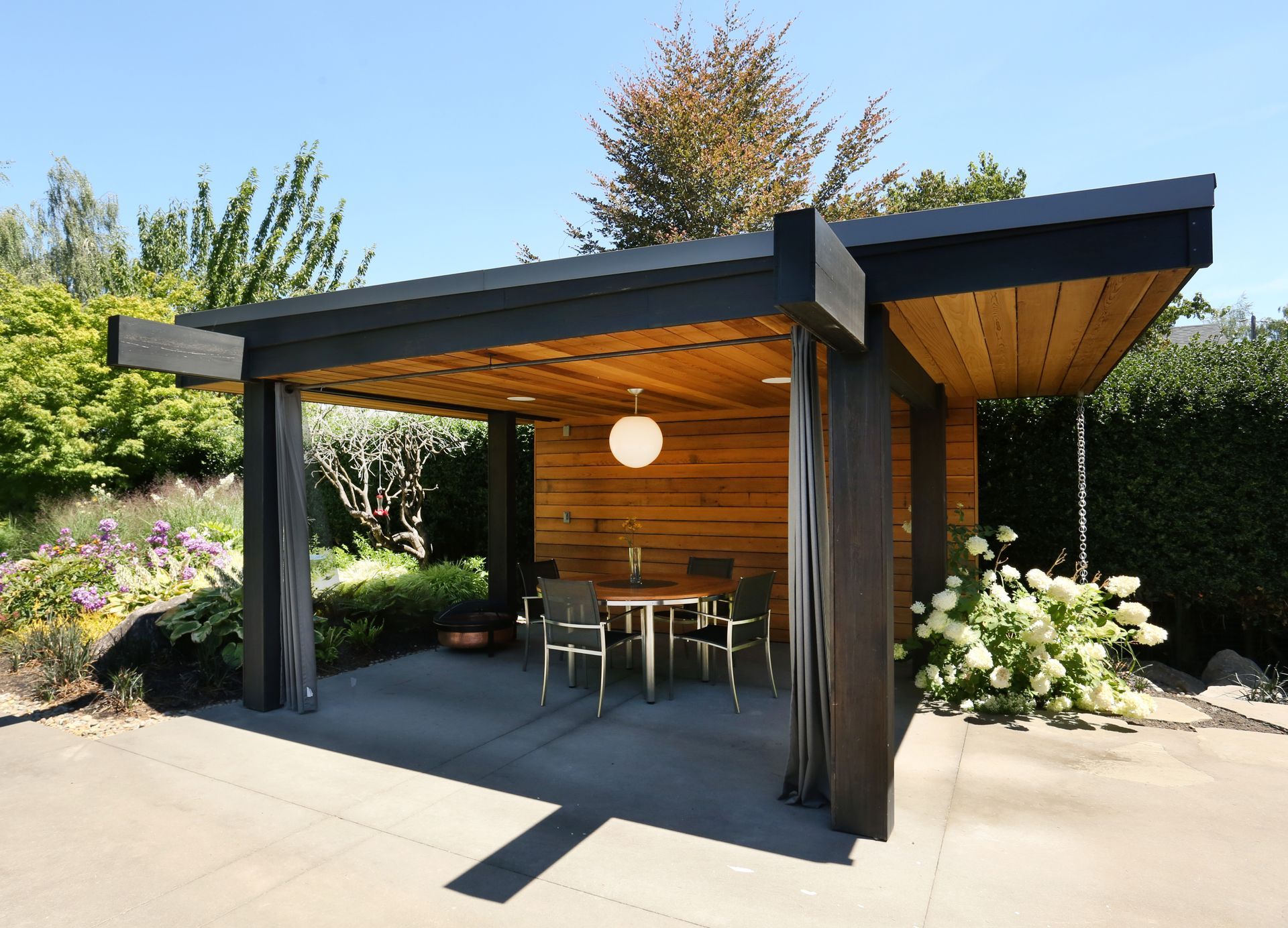 Handsome new covered dining pavilion provides comfortable outdoor living space