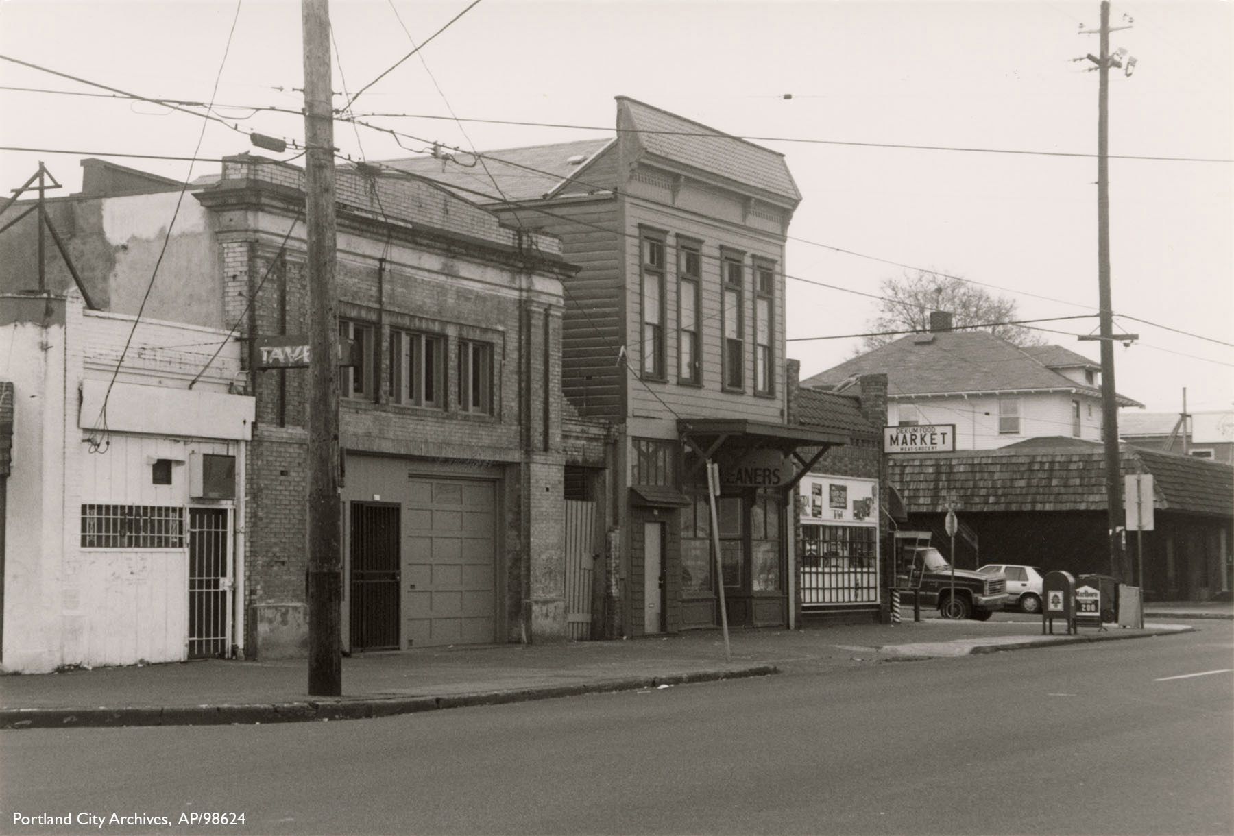 The commercial hub of the Woodlawn neighborhood, known as the Dekum Triangle, was derelict in the 1970s.  