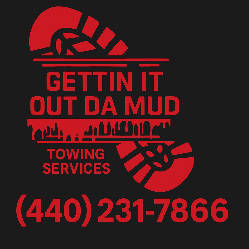 Red and black logo for Gettin It Out Da Mud Towing Services with phone number (216)-630-5219
