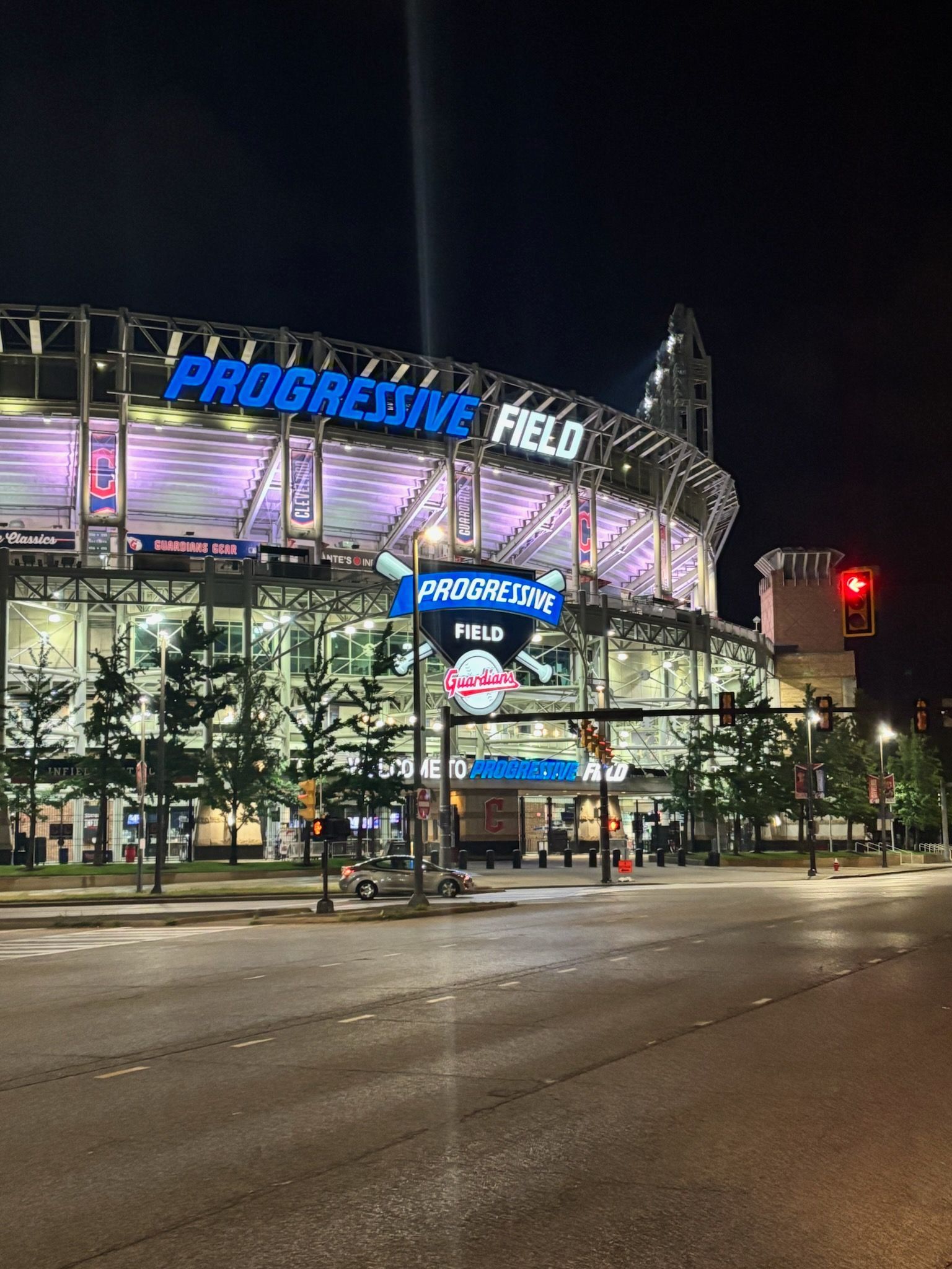 The progressive field is lit up at night