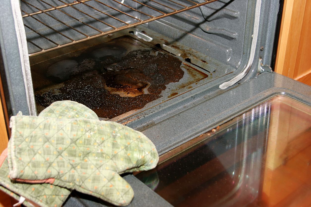 This inside of a dirty, greasy self-cleaning oven.