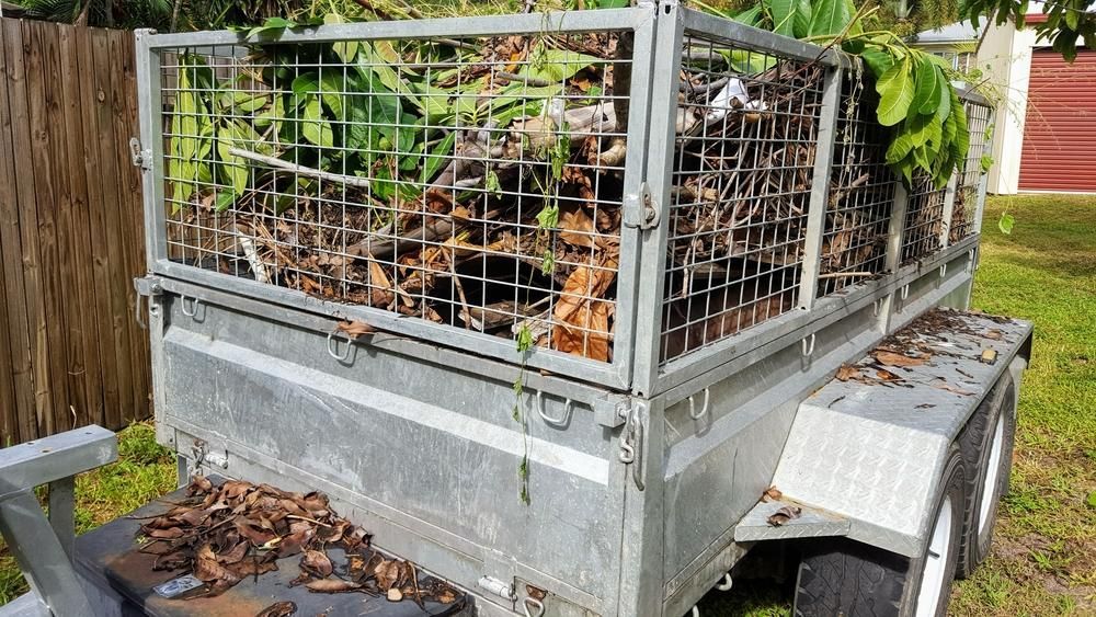 Trailer Full Of Yard And Garden Rubbish — Eclipse Lawn Maintenance in Edmonton, QLD