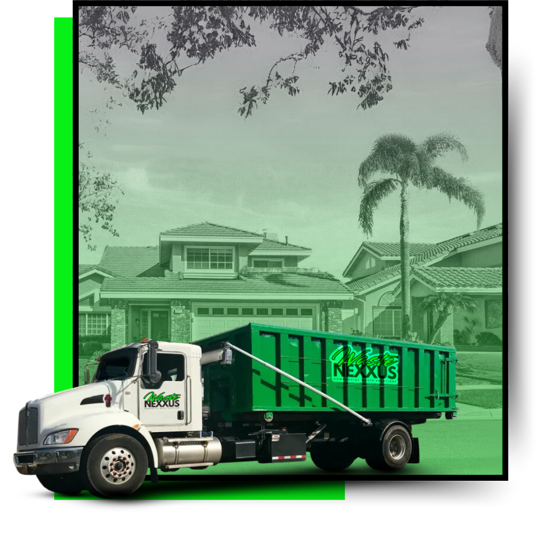 A dumpster truck in front of a house