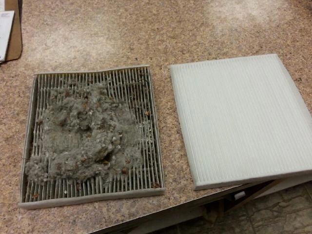 Dirty cabin air filter next to a clean one on a tabletop | Highlift Auto Service