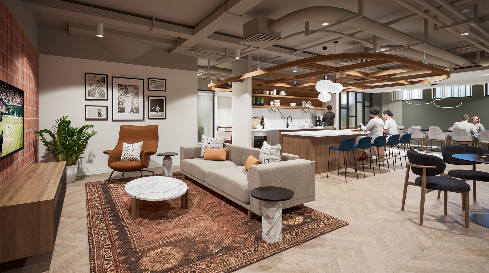 Modern office lounge with sofas, chairs, rugs, and people seated at a shared workspace