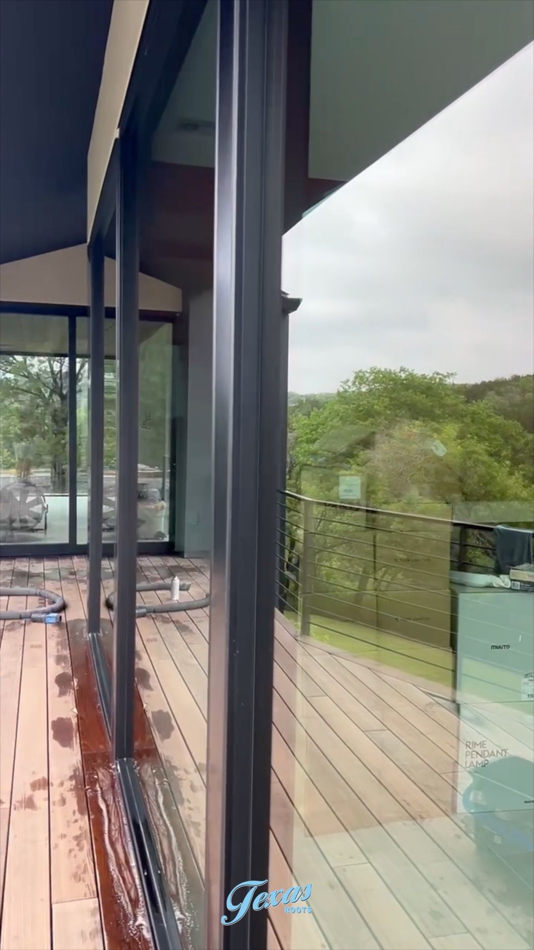     Large modern windows cleaned to restore natural light in Central Texas home