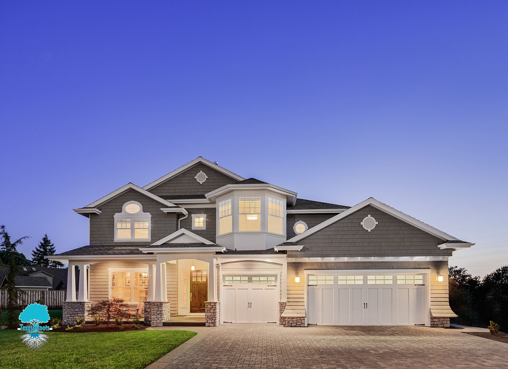 Large House Lit Up At Night | Buda, TX | Texas Roots Property Care