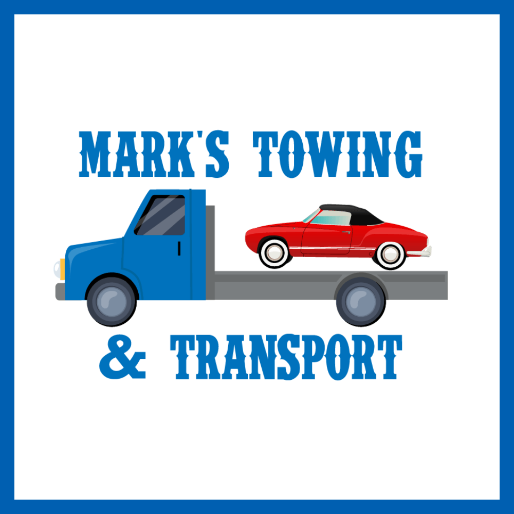 A blue towing truck with a red car on the back of it.