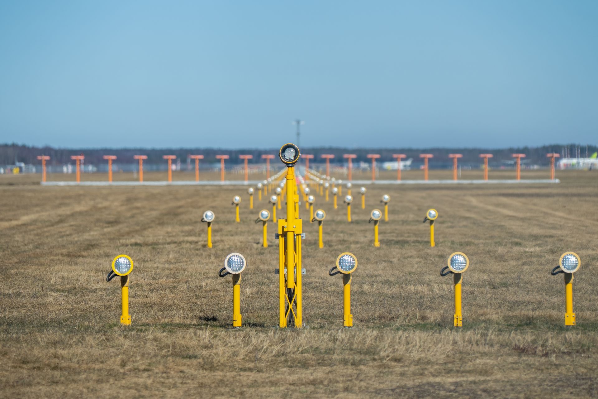 A runway approach lights. A runway approach lights.