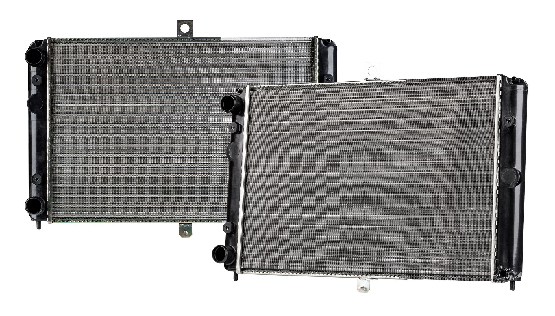 Two black automotive radiators side by side on a white background
