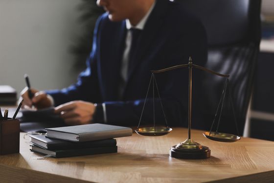 male lawyer working table office focus