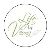 Circular logo reading “Life by Leong” in soft green script on a white background.