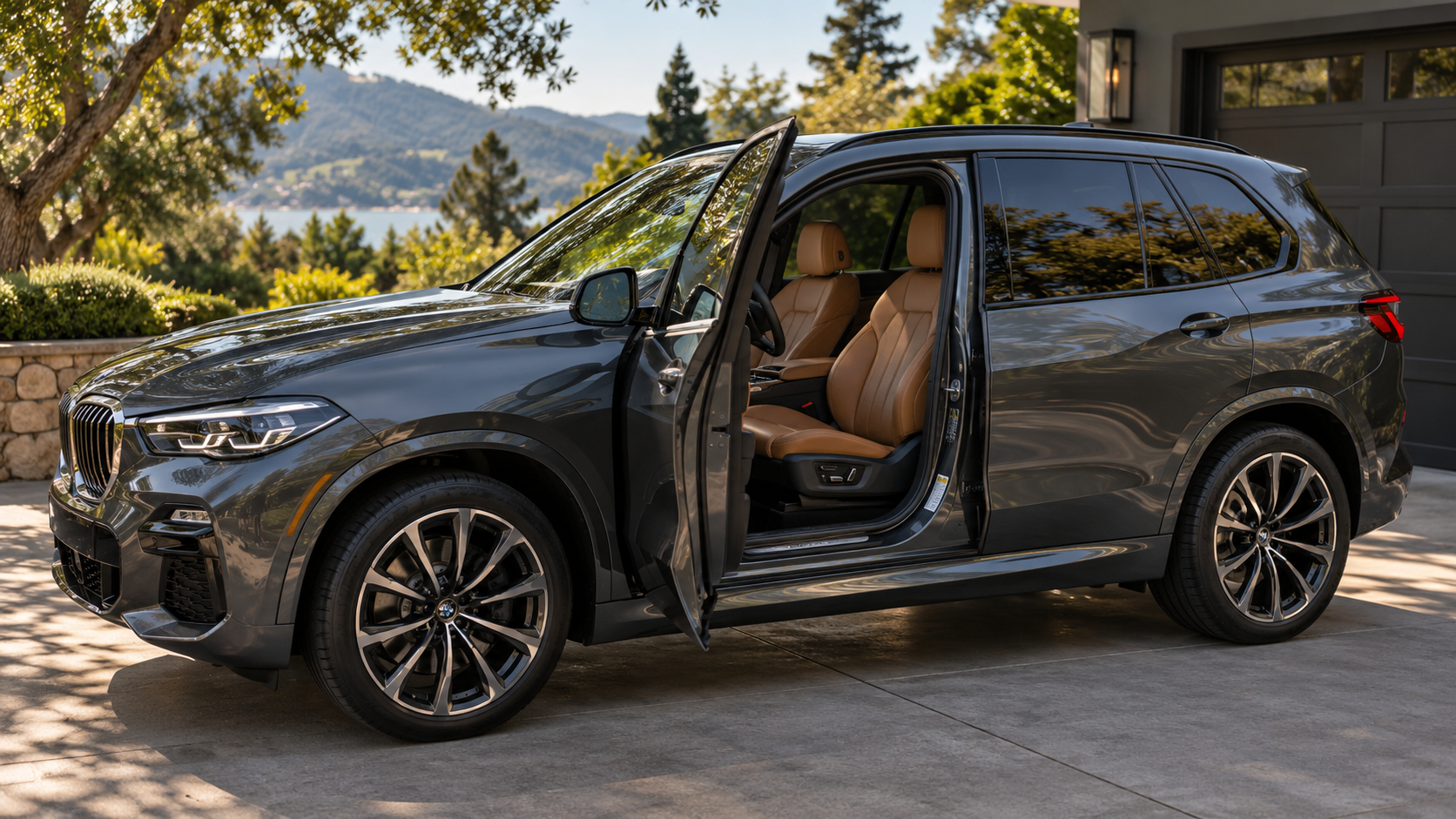 Open vehicle door showing black interior and front passenger seat with orange trim.