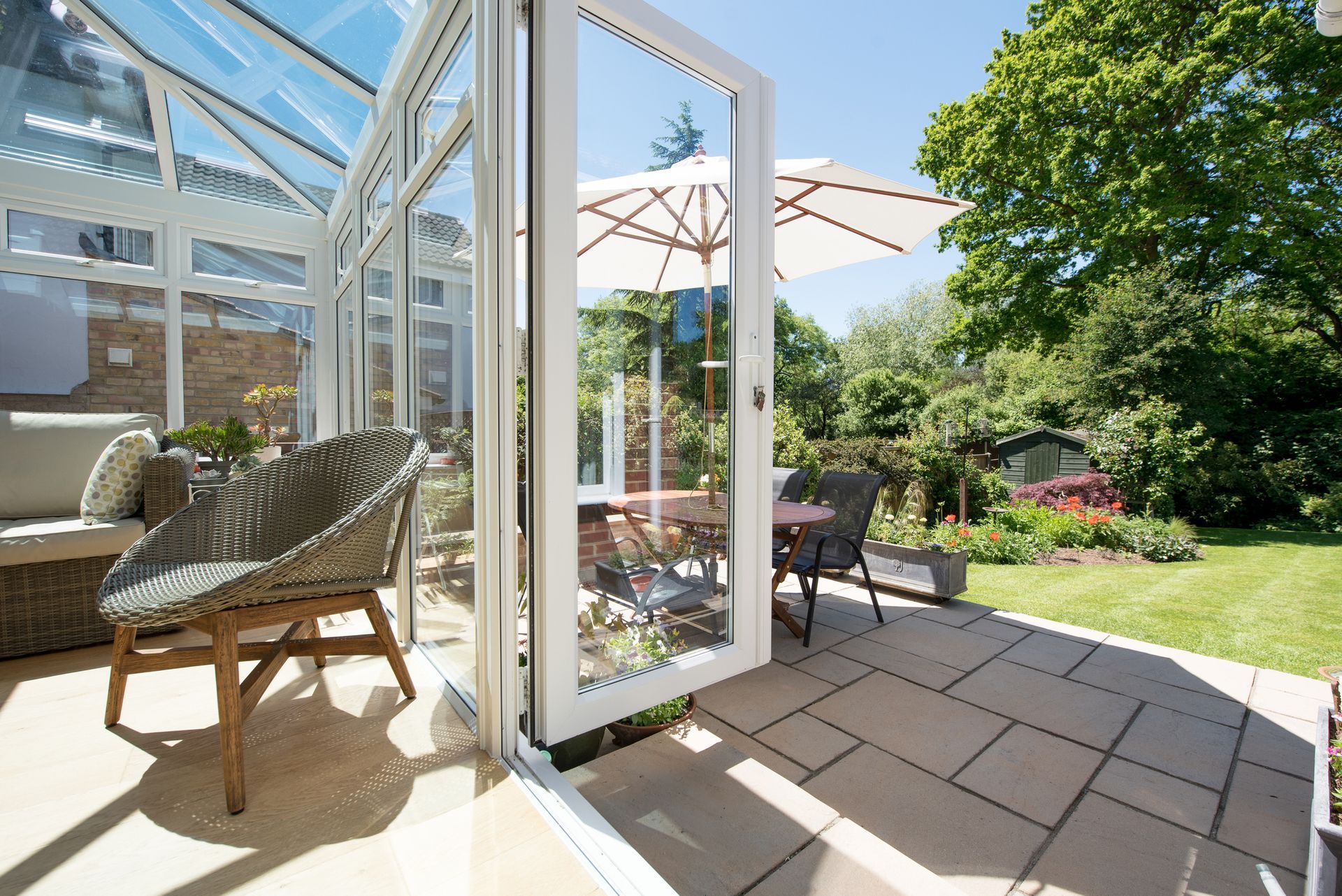 A glass patio with chairs - Douglassville, PA - Integrity Home Remodel
