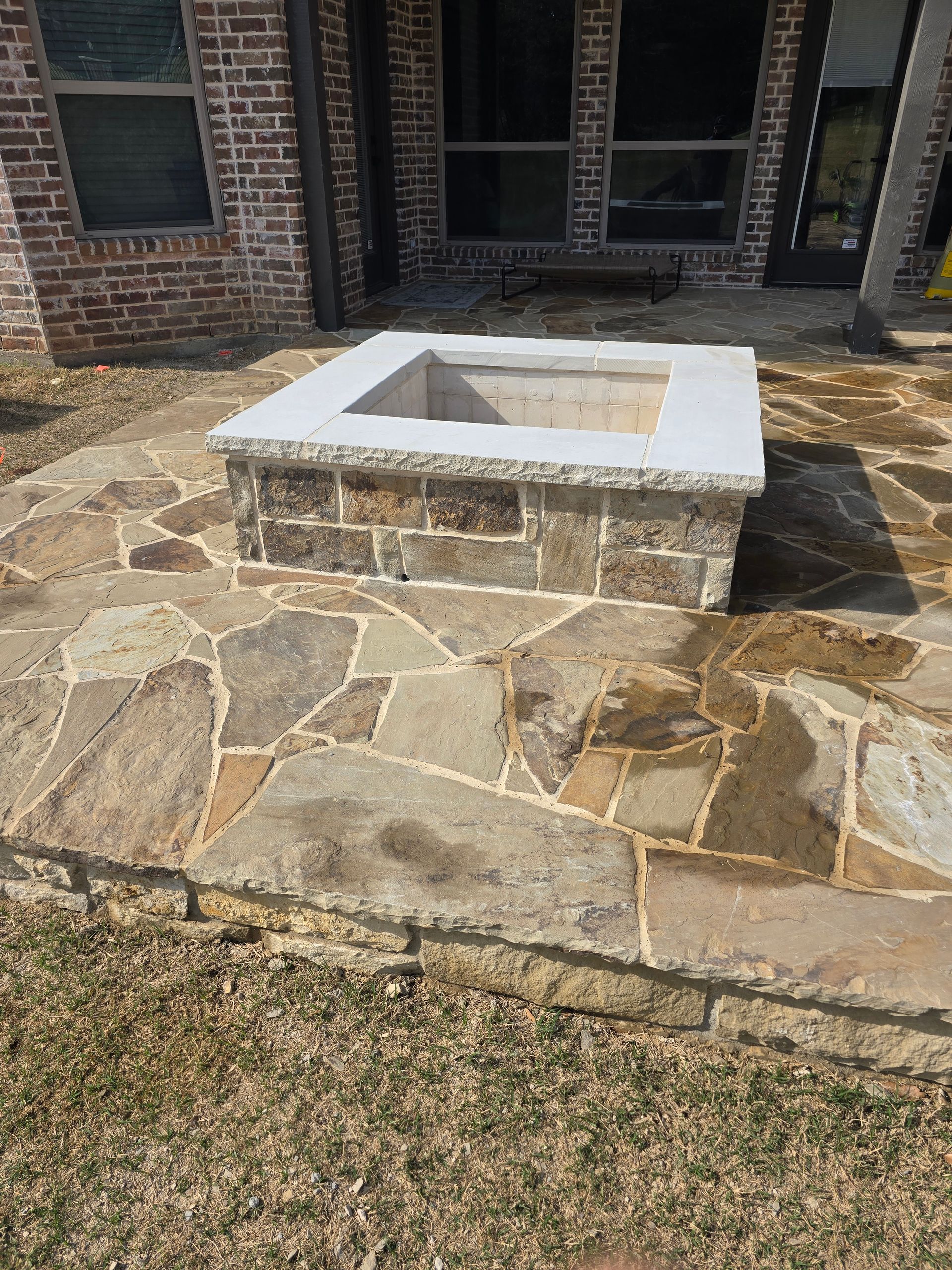 โBackyard stone patio Fort Worth Texasโ