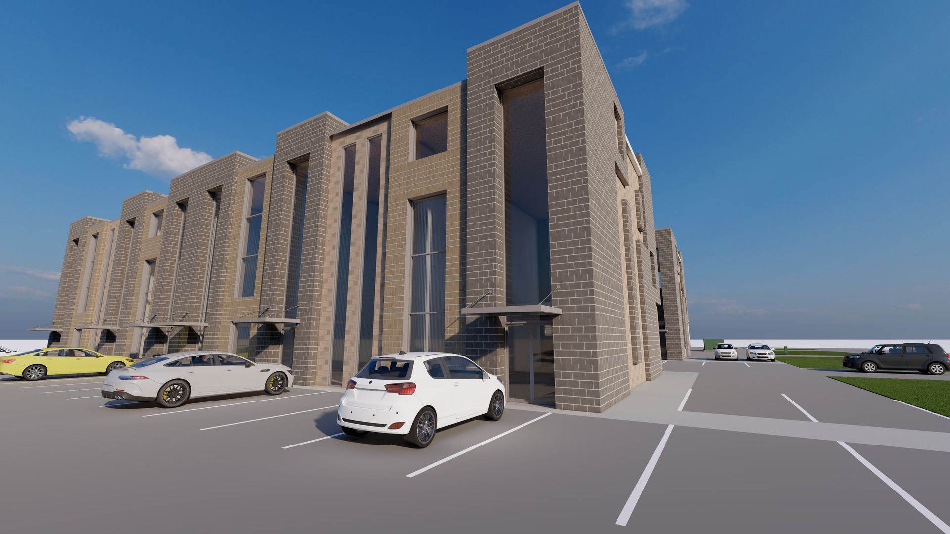 A modern brick townhouse building with large vertical windows, situated in a parking lot with several parked cars.