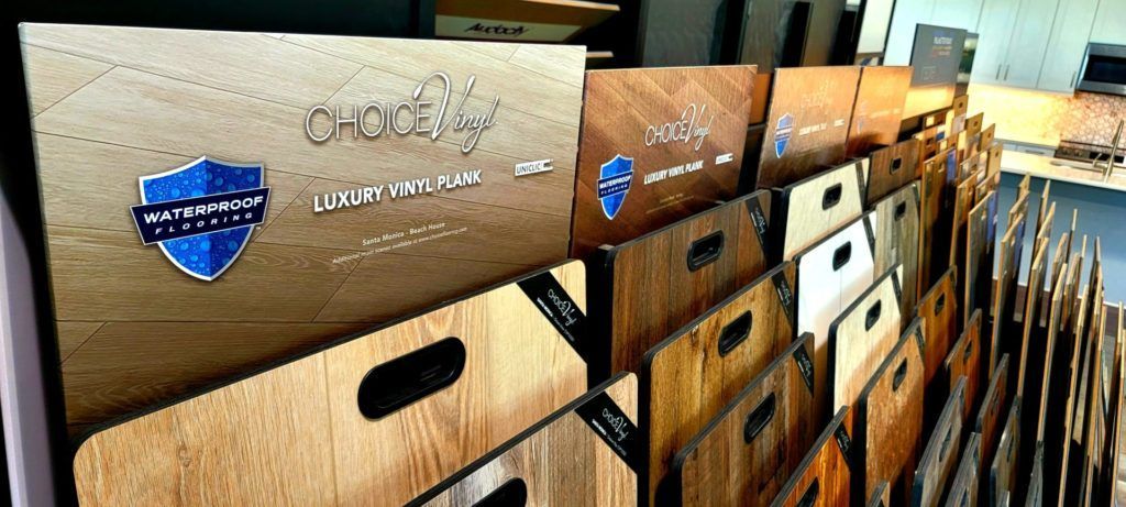 Rows of cardboard file boxes with oval handles and blue labels stacked on shelves.