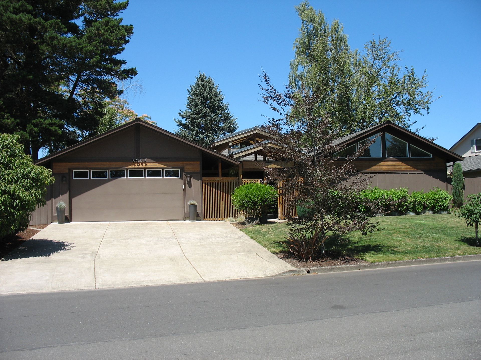 A house with a large garage and a driveway