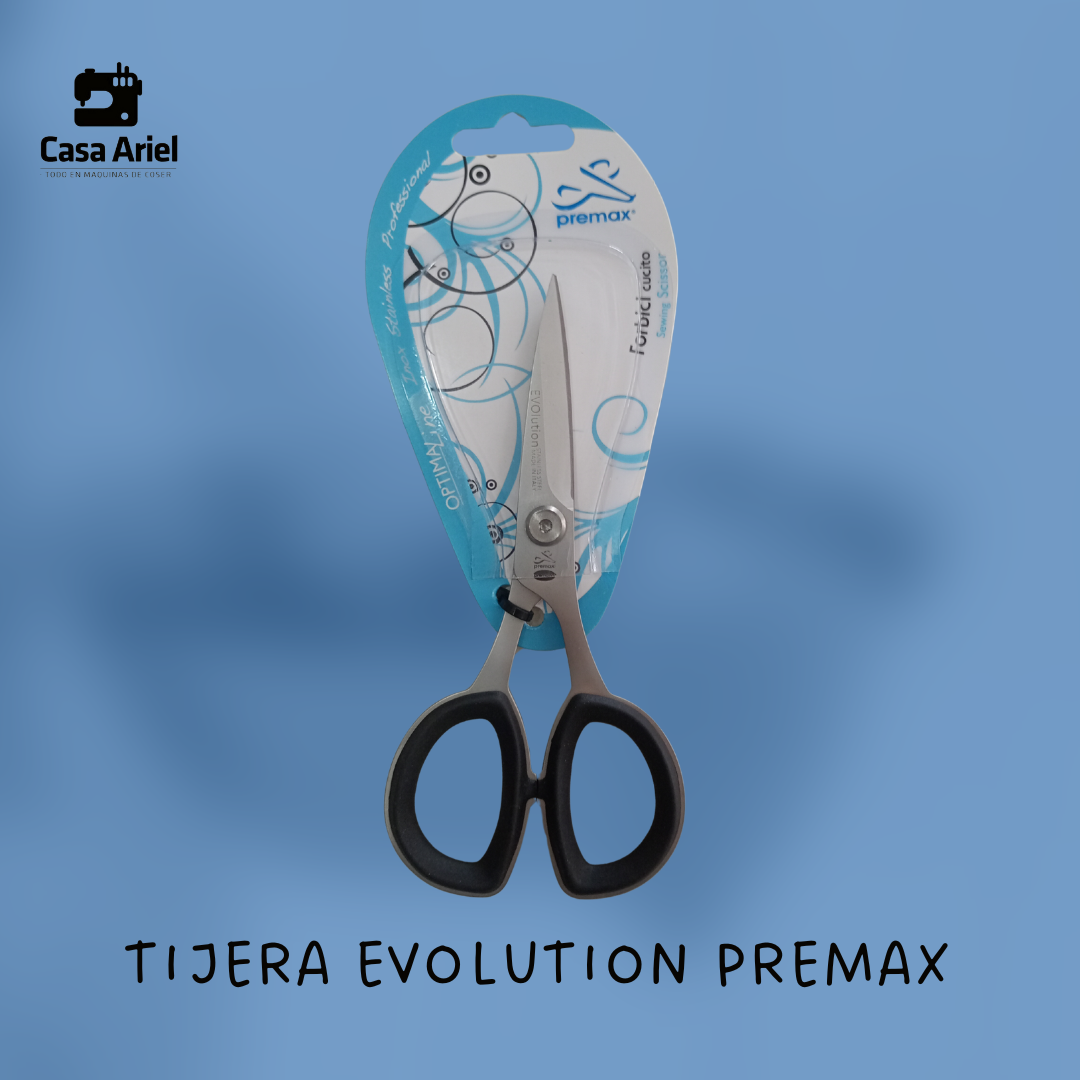 Tijeras en embalaje, mangos negros, hojas plateadas, sobre fondo azul, texto “Tijera Evolution Premax”.