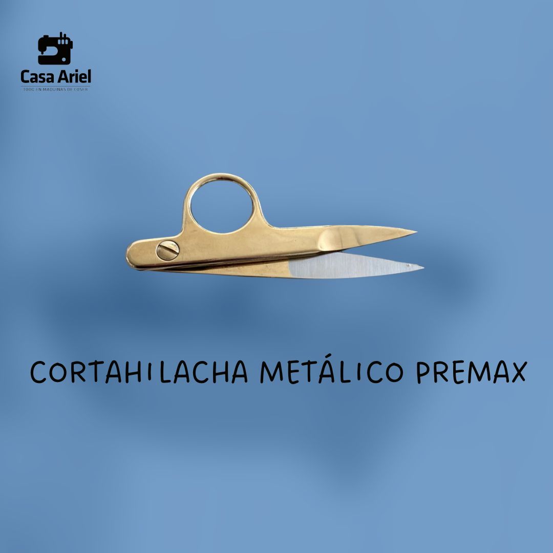 Un par de tijeras colocadas sobre una superficie azul.