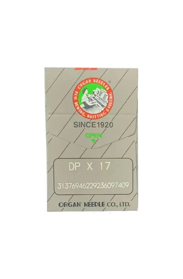 Un paquete beige de agujas para máquina de coser Organ Needle Co., Ltd. modelo DPx17 con la marca en verde y rojo.