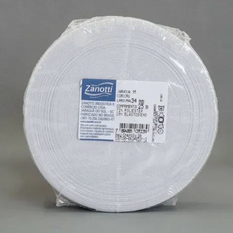 Un carrete de goma elástica blanca de la marca Zanotti, envuelto en plástico transparente y centrado sobre un fondo gris.