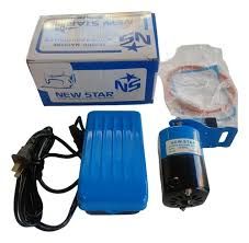 Un kit de motor para máquina de coser de la marca New Star que incluye una caja azul, un pedal