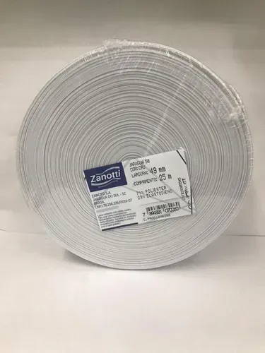 Un rollo grande de goma elástica blanca de Zanotti con la etiqueta del producto, centrado sobre un fondo blanco liso.