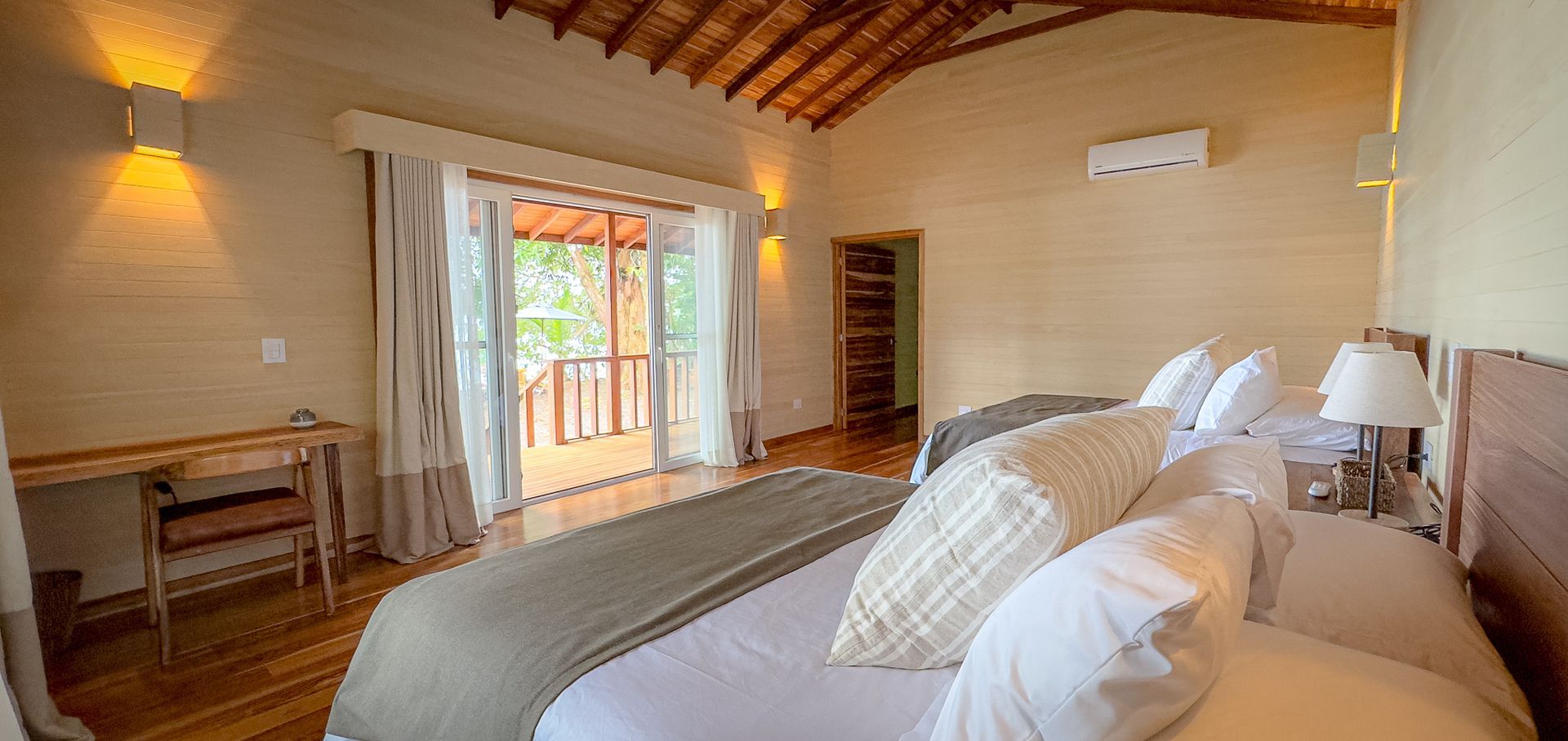 There is a large bed in the middle of the room.