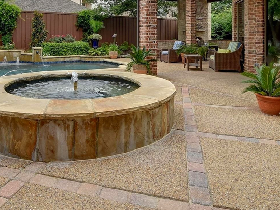 Nice backyard with features made from materials that needed a crane lift