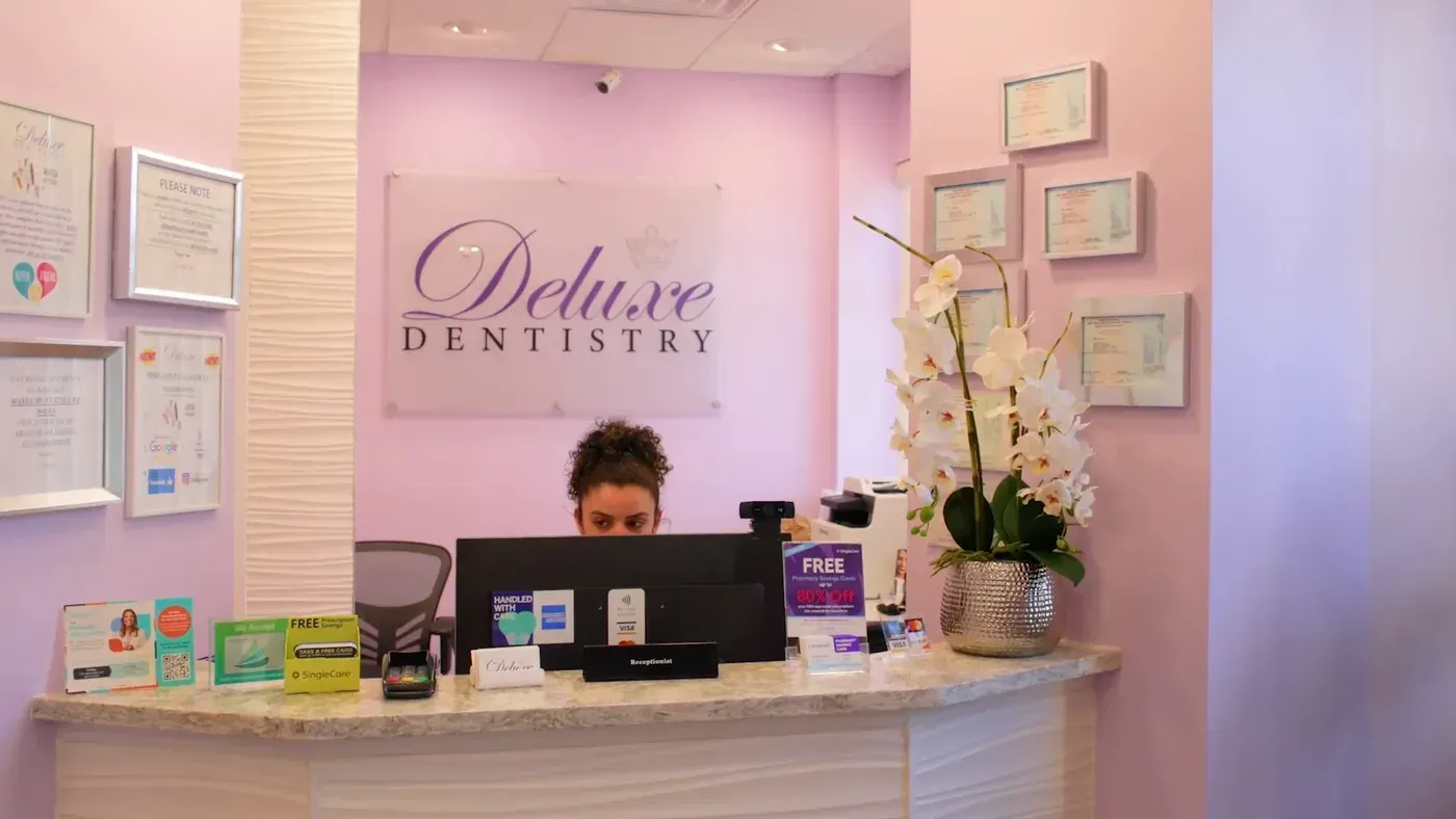 Deluxe Dentistry & Esthetics front desk, where Invisalign patients check in for consultations and checkups