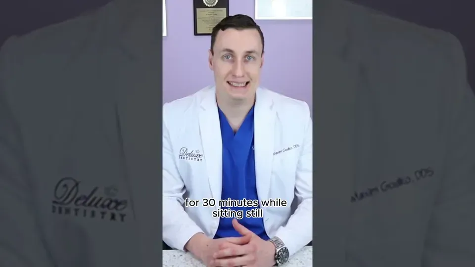 Managing bleeding in the hours after a tooth extraction, aftercare guidance in a Deluxe Dentistry & Esthetics video