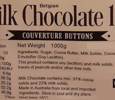 Label for Belgian milk chocolate couverture buttons with ingredient and nutrition text.