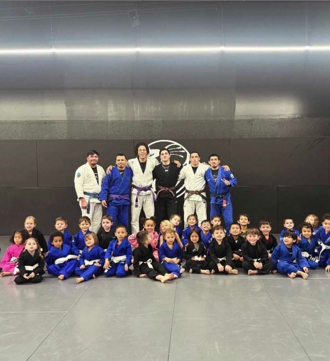 Students practice Brazilian Jiu Jitsu drills at Cobrinha Southwest in Las Vegas, NV, building confidence and focus.