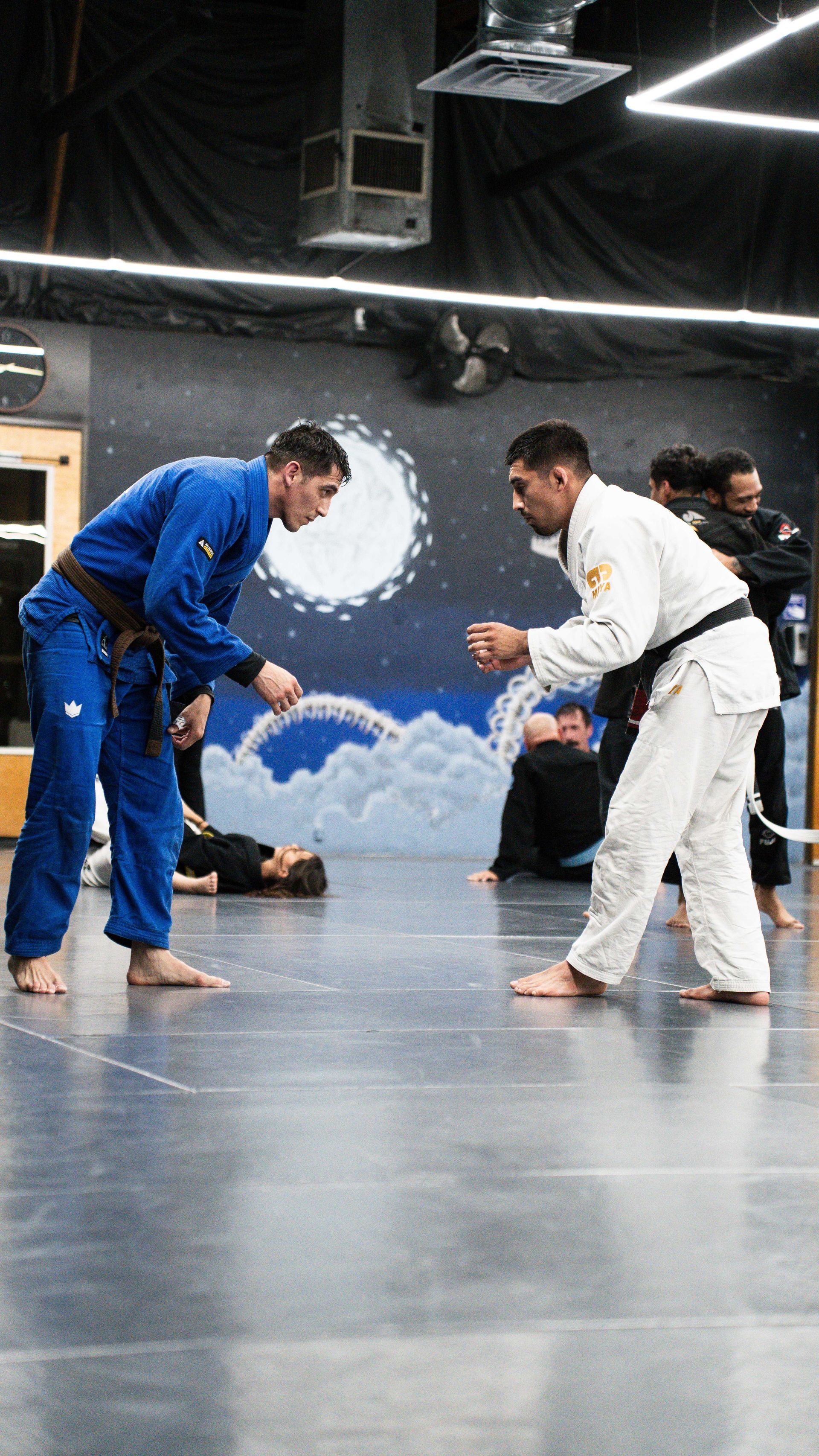 Students practice Brazilian Jiu Jitsu grappling at Cobrinha Southwest in Las Vegas, NV, building calm confidence.