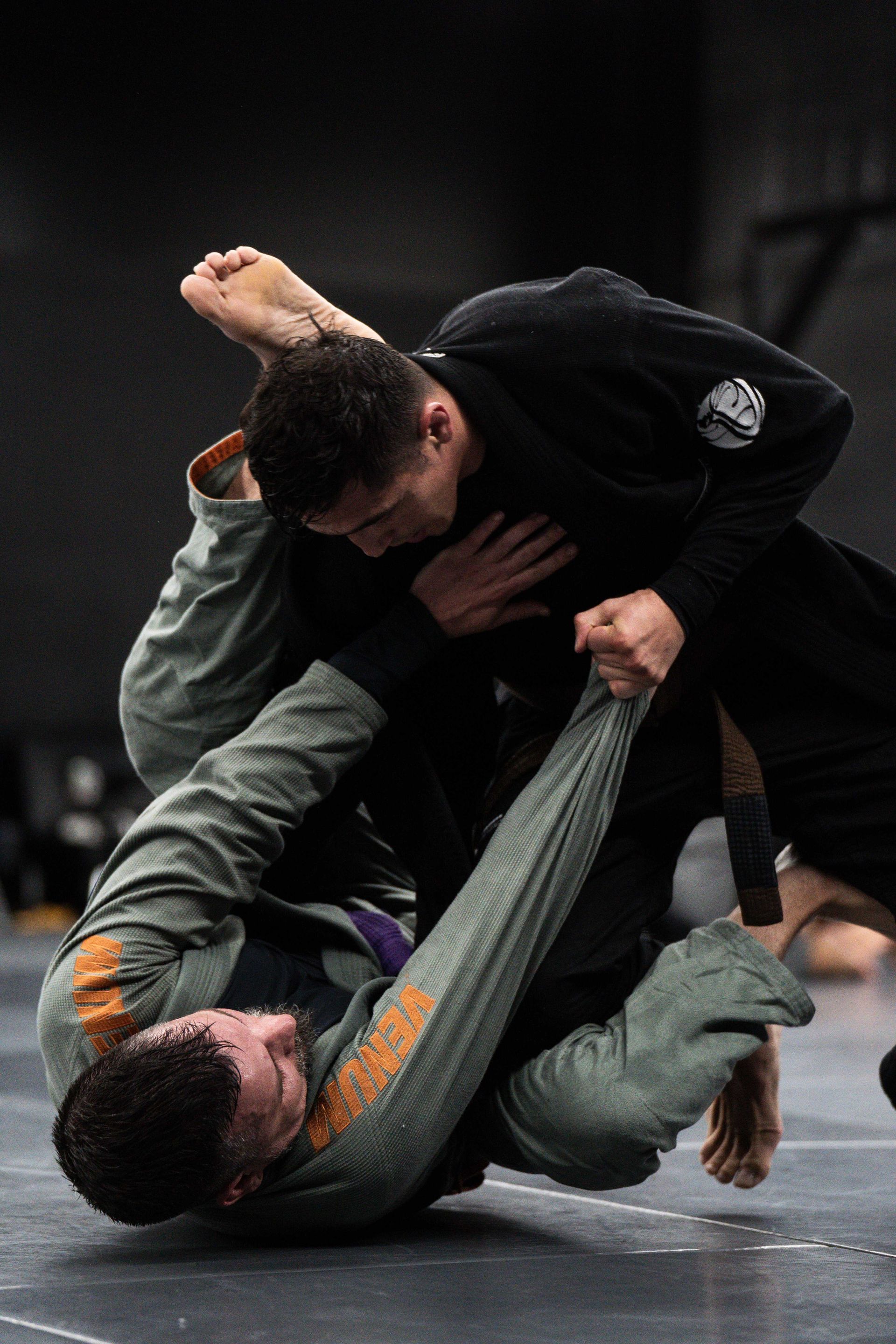 Adults training Brazilian Jiu Jitsu at Cobrinha Southwest in Las Vegas, NV to build real life confidence.