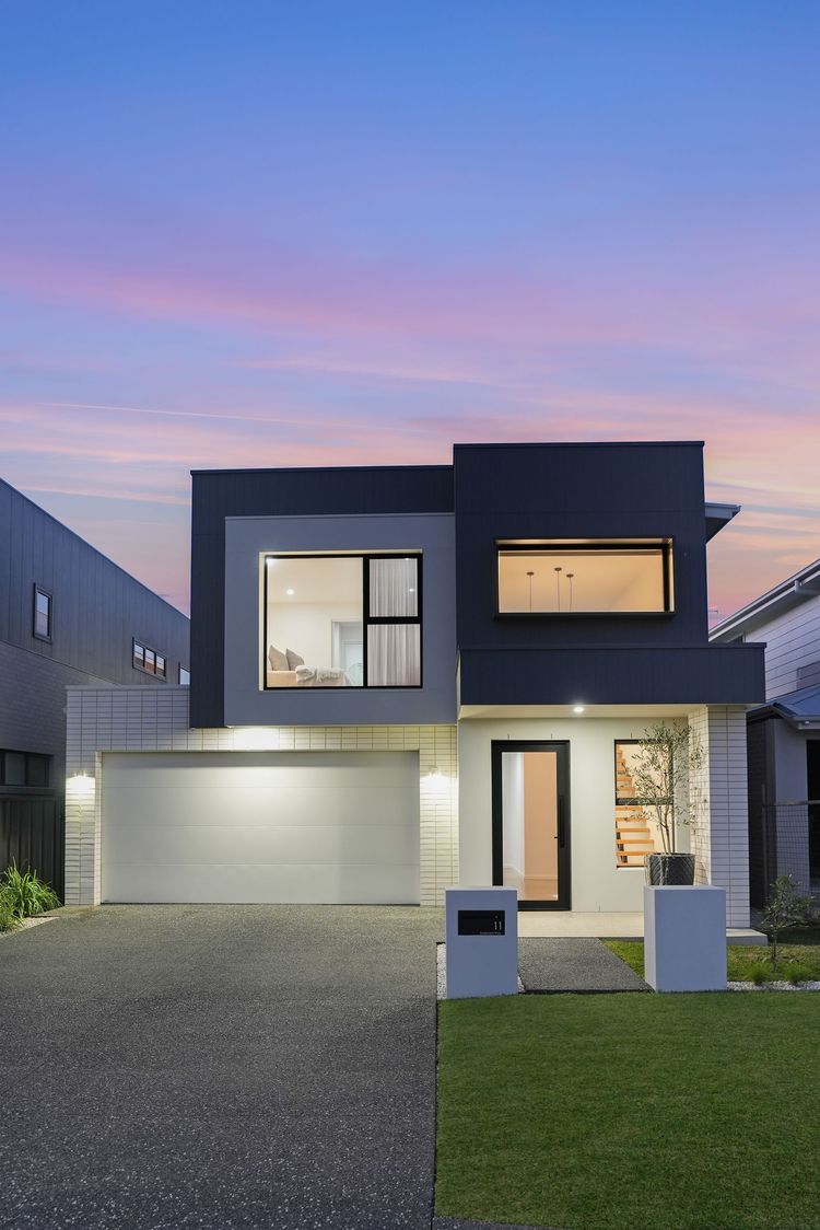 a large house with a mailbox in front of it