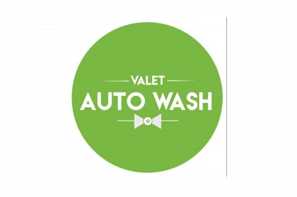 Logo for Valet Auto Wash, green circle with white text: "VALET AUTO WASH".