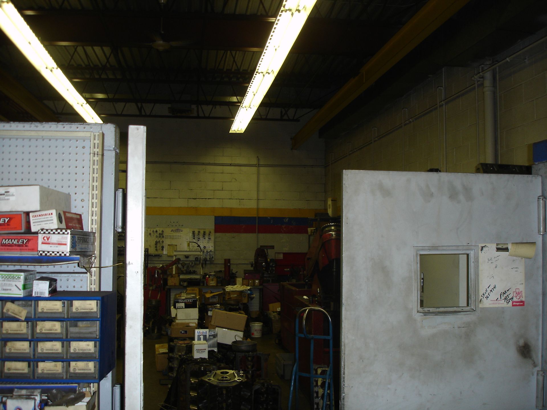 A warehouse with a sign on the wall that says light