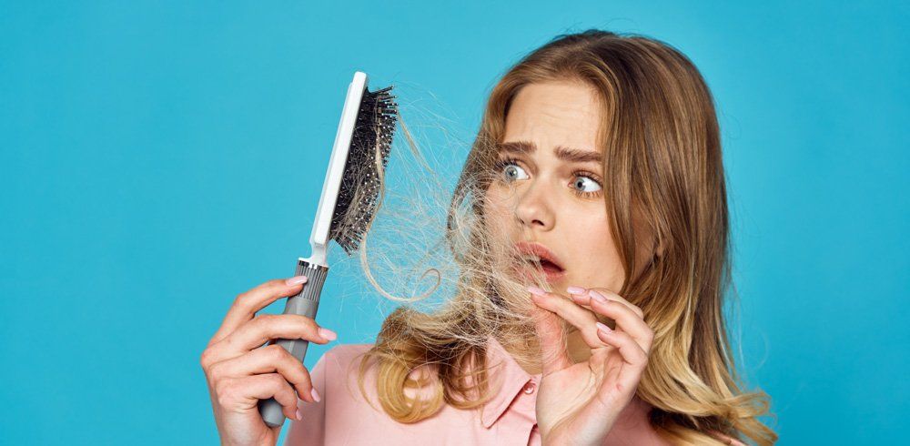 What causes thin hair?