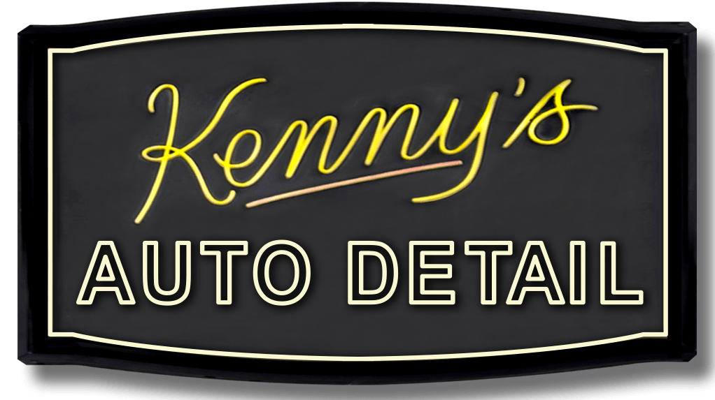 The logo for kenny 's auto detail is black and yellow
